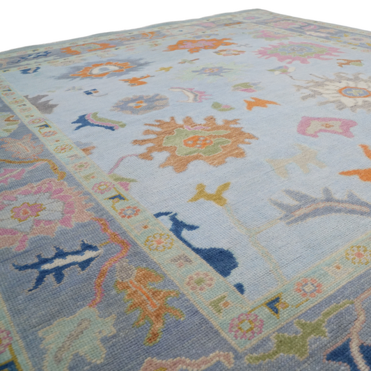 Colorful floral-patterned rug on a plain background