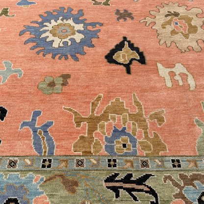 Close-up of a colorful patterned rug with geometric designs.