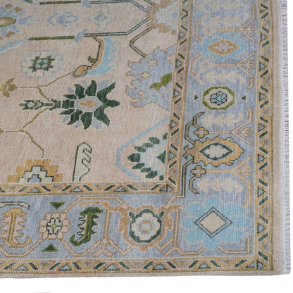 Close-up of a patterned rug with floral and geometric designs.