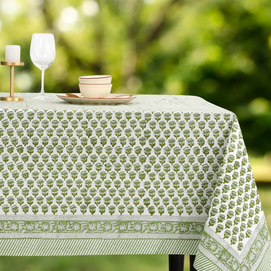 Tablecloth with a green pattern on a table outdoors