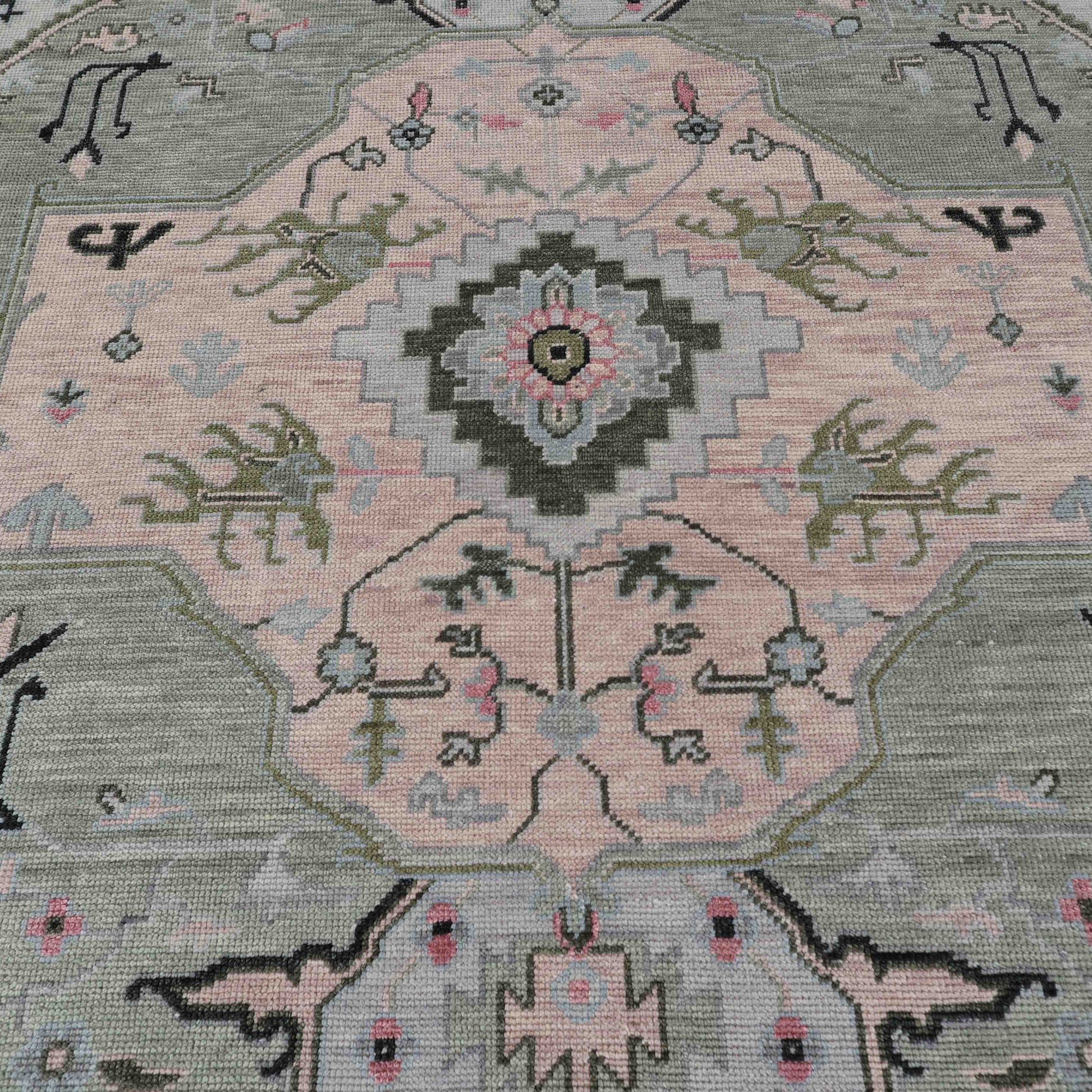 Close-up of a patterned rug with geometric design