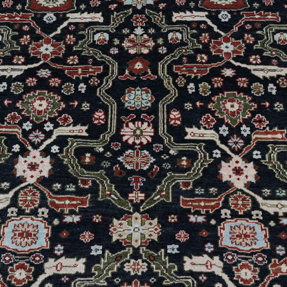 Close-up of the Eleanor rug’s navy, red and pale blue pattern